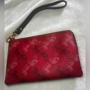 Coach Corner Zip Wristlet in the color 1941 Red with Horse and Carriage print.